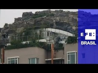 Pequim ordena demolição de montanha construída sobre prédio