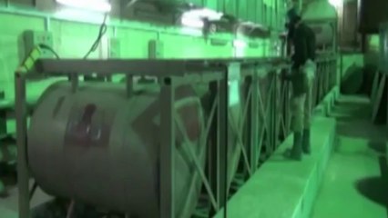 Syria releases images of weapons inspectors at work
