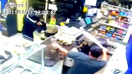 Watch This Deli Clerk Go After a Robber With a Machete