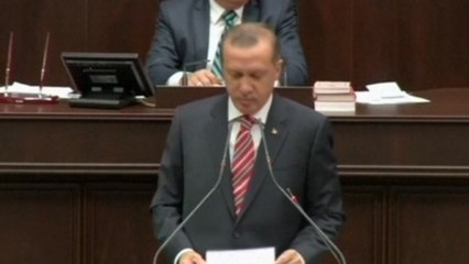 Turkey lifts ban on head scarfs