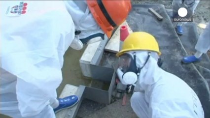 Contamination fears after Fukushima workers doused with...