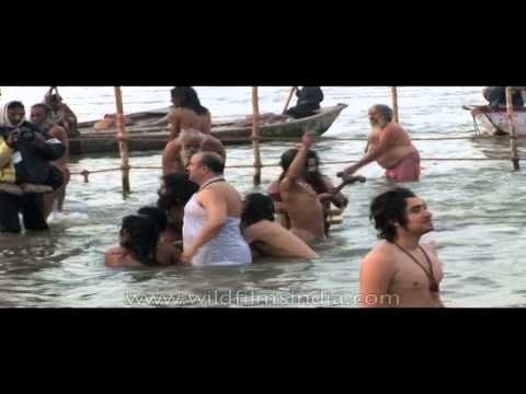 Devotees taking holy dip at Ardh Kumbh Mela