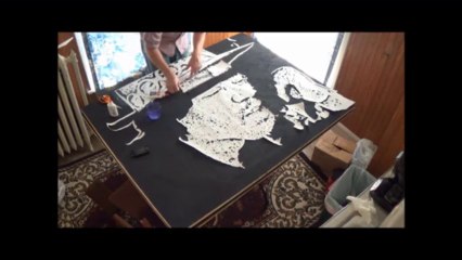 A cut out of paper portrait of Jimi Hendrix