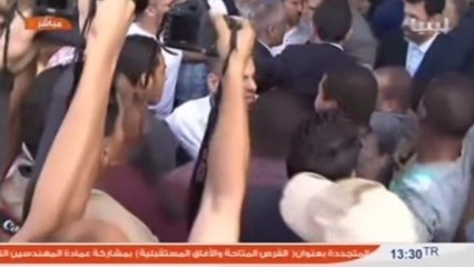 Libya's Zeidan arrives back at office after release