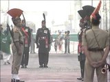 Indian soldier and Pakistan soldier facing each other at Wagah Border