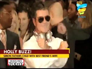 Simon Cowell Fathers A Love Child