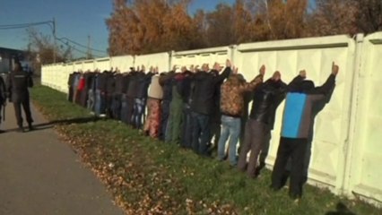 Police rounding up migrants in Moscow after riots