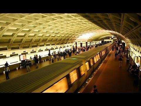 Man in wheelchair rolls onto train track, saved by samaritans