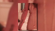 Lindsay Lohan Explains Her Altered Triangle Tattoo