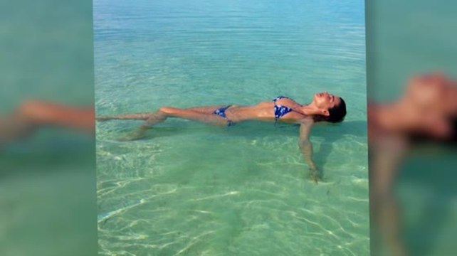 Miranda Kerr Shows Off Her Bikini Body on a Family Beach Break