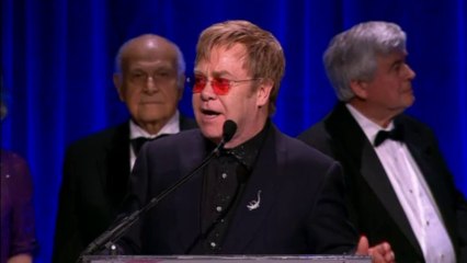 Elton John honours Hillary Clinton at annual AIDS Foundation