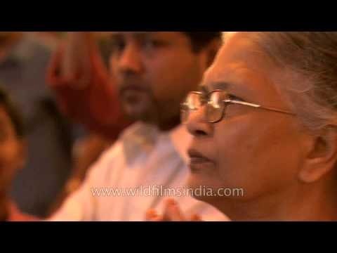 Devotees paying reverence to Maa Durga on Maha Shasti day of Durga puja