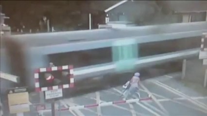 Lucky Cyclist Escapes by INCHES of Her Life! (Video @ Break4pk.com)