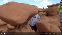 Dumb guy destroys big rocks in Goblin Valley.