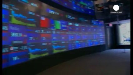 Google shares surge to record highs with last quarter...