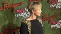 Theron dazzles on carpet, McCartney performs in London