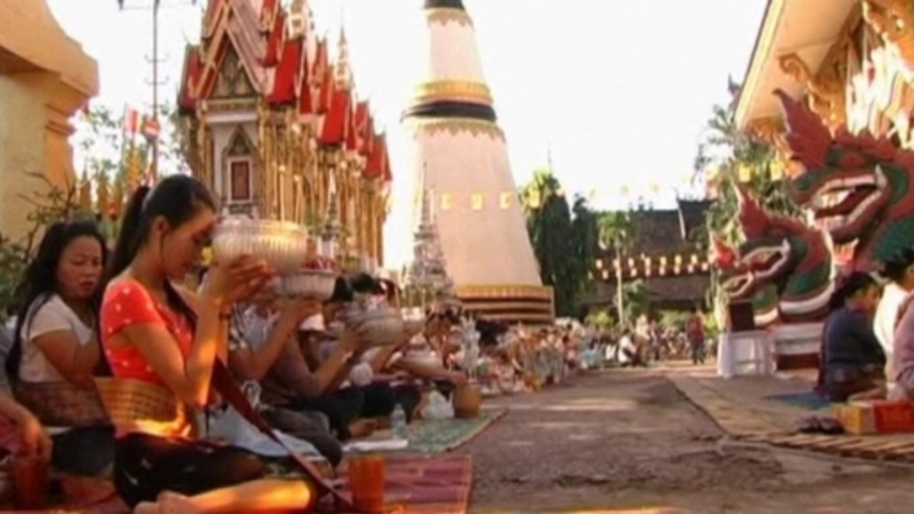 Laos crash victims moved to temple