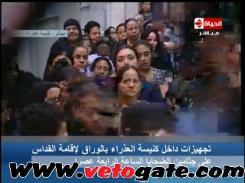 تجهيزات داخل كنيسة الوراق لاقامة القداس على جثامين الضحايا
