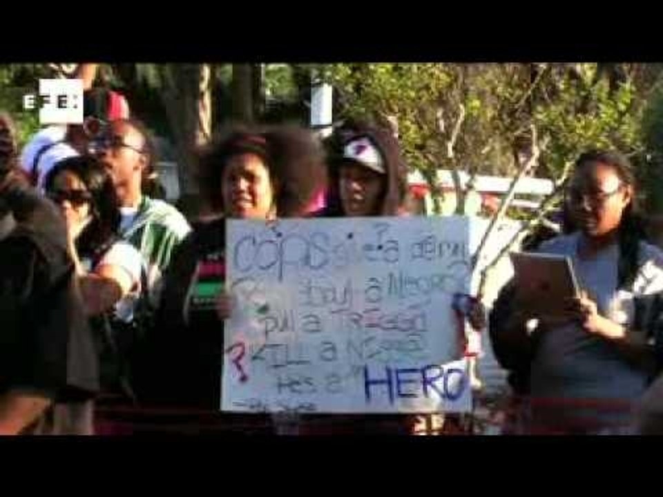 Protests grow one month after unarmed black American youth killed