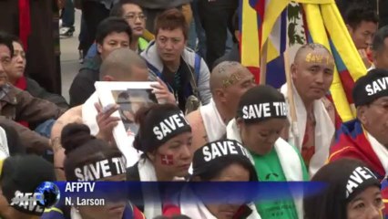 Tibetan protest at UN against China rights abuses