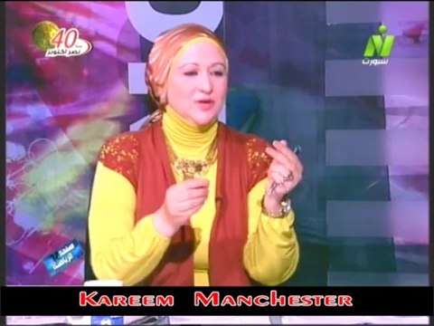 الاعلاميه مني عبد الكريم فى صفحه الرياضه مع الاستاذ علاء محجوب رئيس القسم الرياضى بمجلة المصور