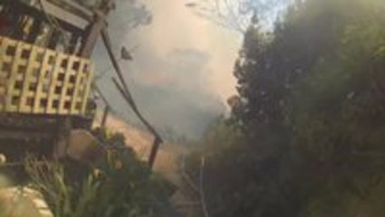 First person view of fireman fighting Australian wildfire