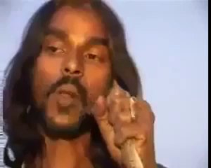 A man eating snake alive