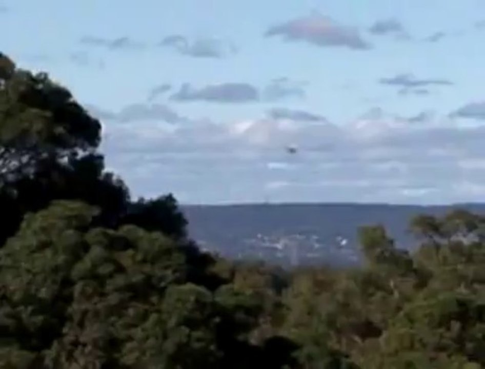 Clear UFO Orb flying through the sky