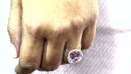 Kim Kardashian flashes engagement ring at event with Kanye