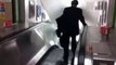 Hilarious Video Drunk Businessman Wrong Way Down Tube Escalator FAIL