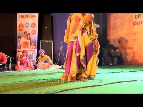 Amazing! Woman balancing pots and dancing on the swords - CR Park Durga Puja Celebrations