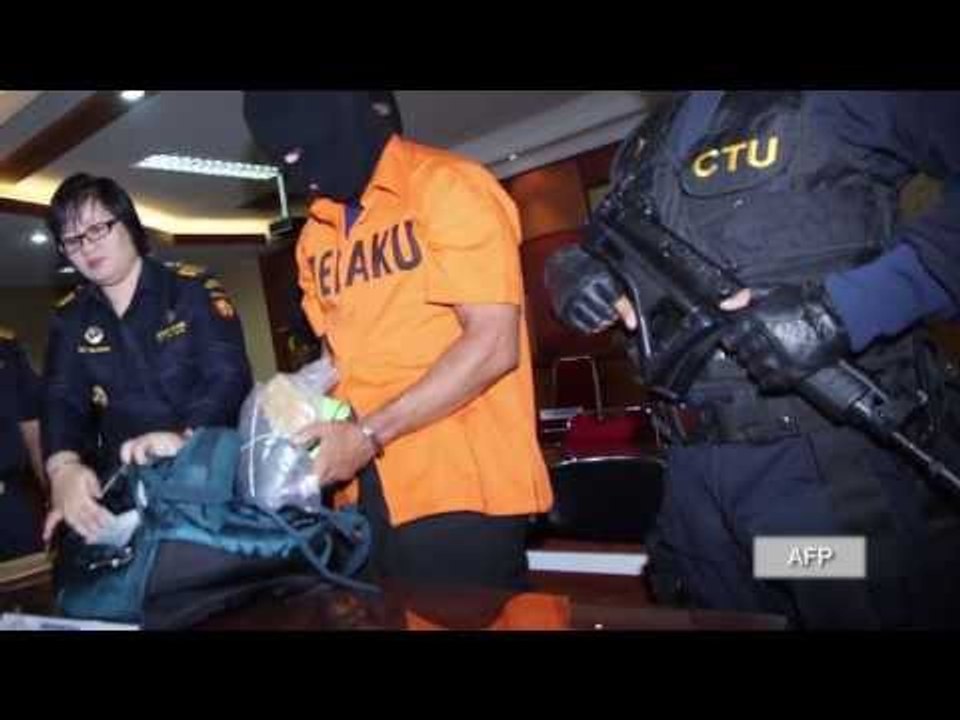 Malaysian cop arrested for smuggling crystal meth into Indonesia