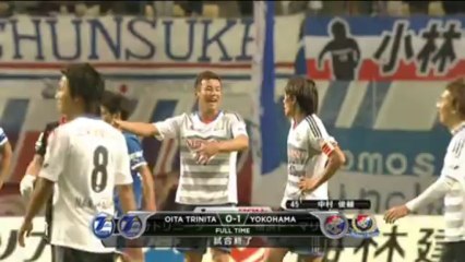 Yokohama edge Oita to stay top