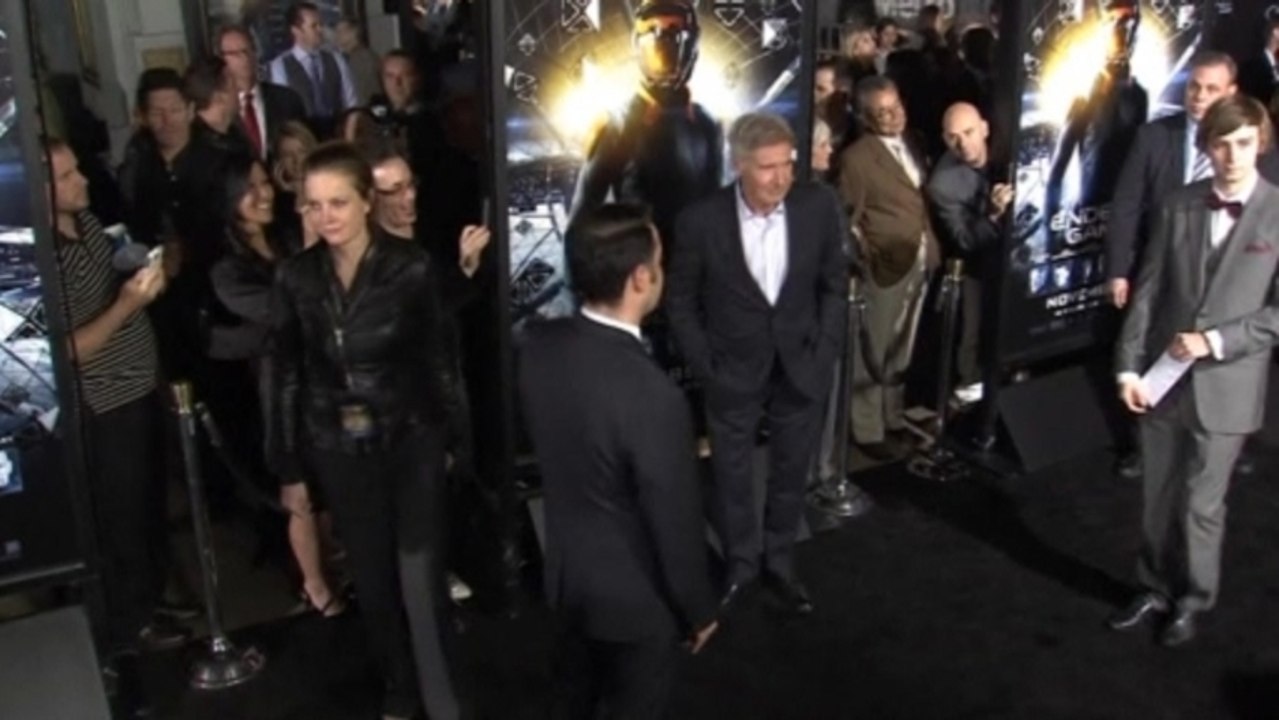 Ford, Kingsley hit 'Ender's Game' premiere