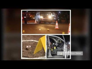 Two men killed in shooting at traffic-light junction