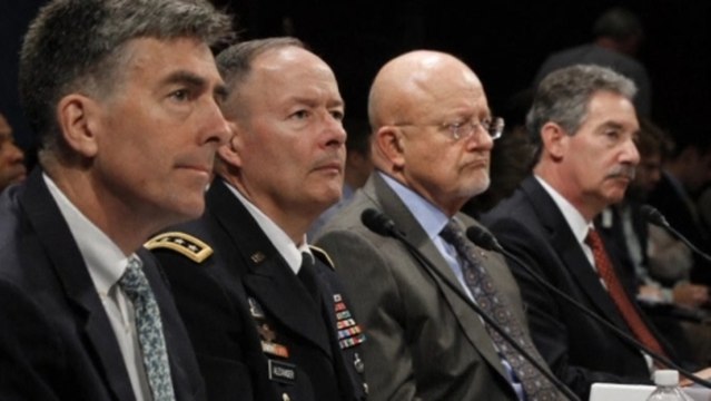 Top U.S. intelligence chiefs call spying reports false