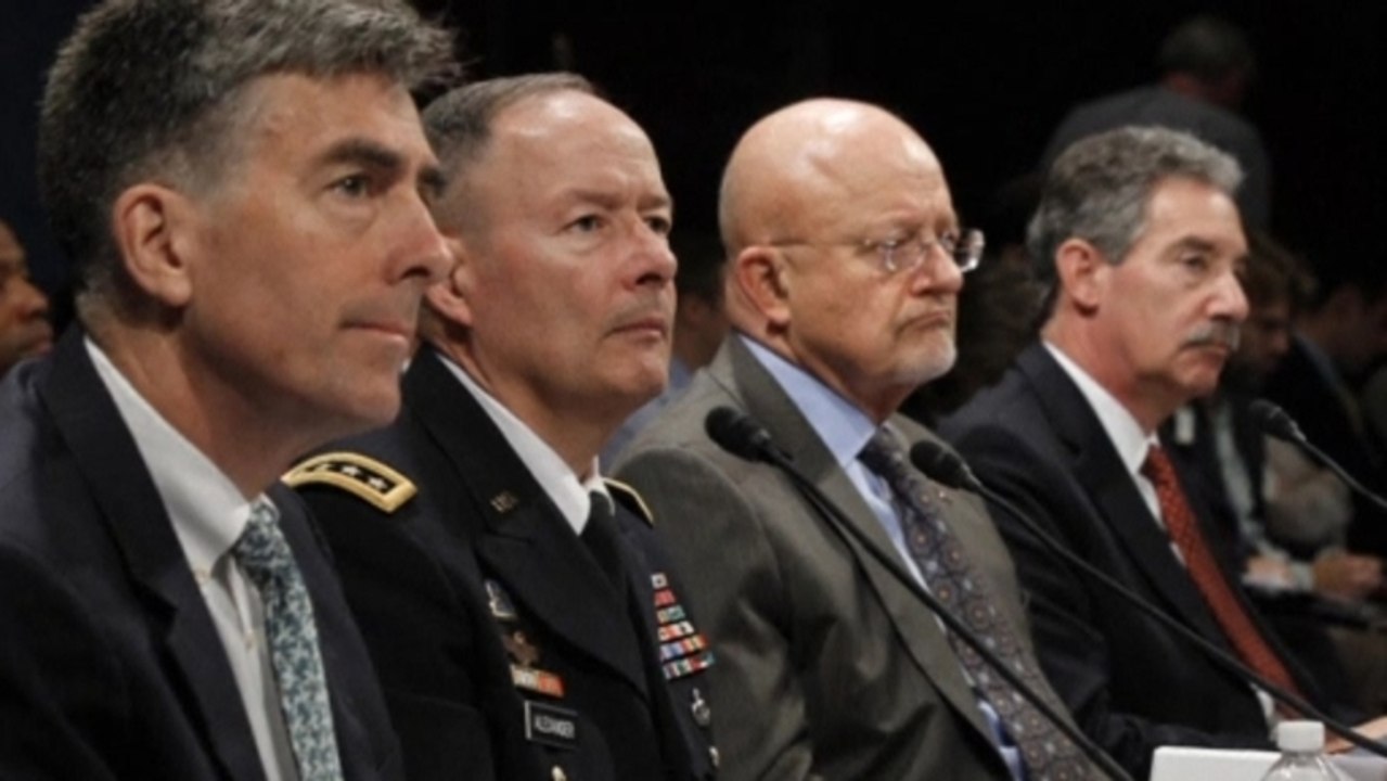 Top U.S. intelligence chiefs call spying reports "false"