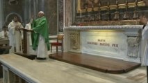 Pope Francis visits John Paul II's tomb