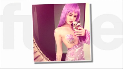 Miley Cyrus Goes As Lil Kim for Halloween