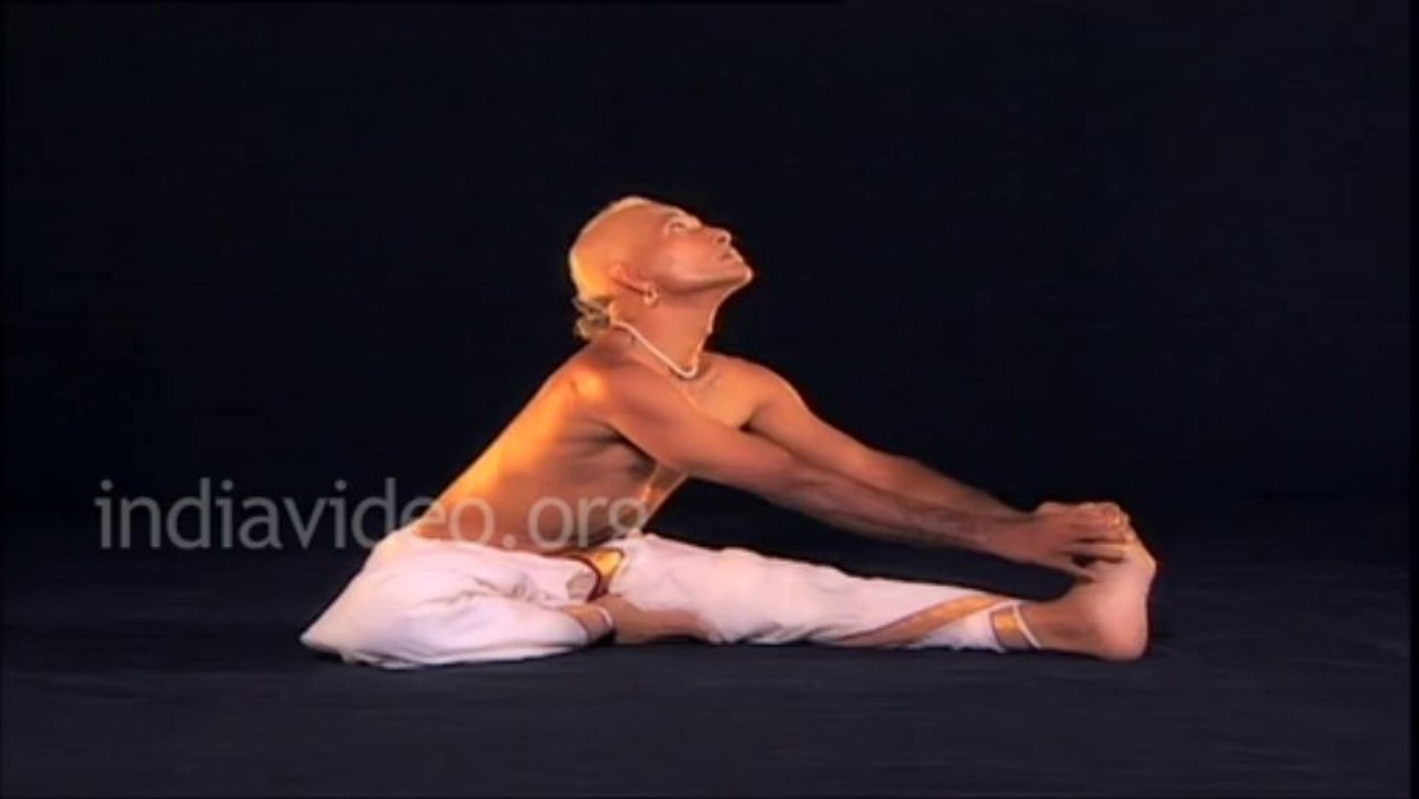 Yoga expet The Head to knee pose- Janu Sirshasana