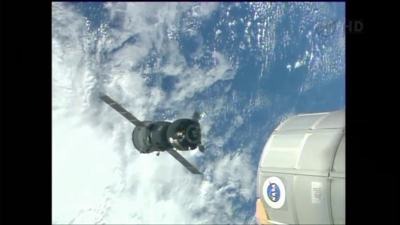 [ISS] Soyuz TMA-09M Relocates to Make Way for Olympic Torch Carrying Soyuz TMA-11M