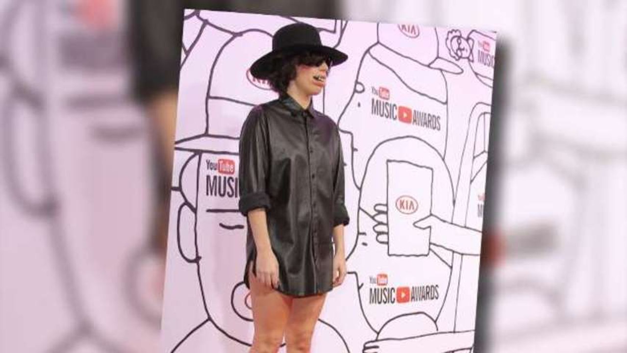 Lady Gaga Sports Spooky Teeth Grill