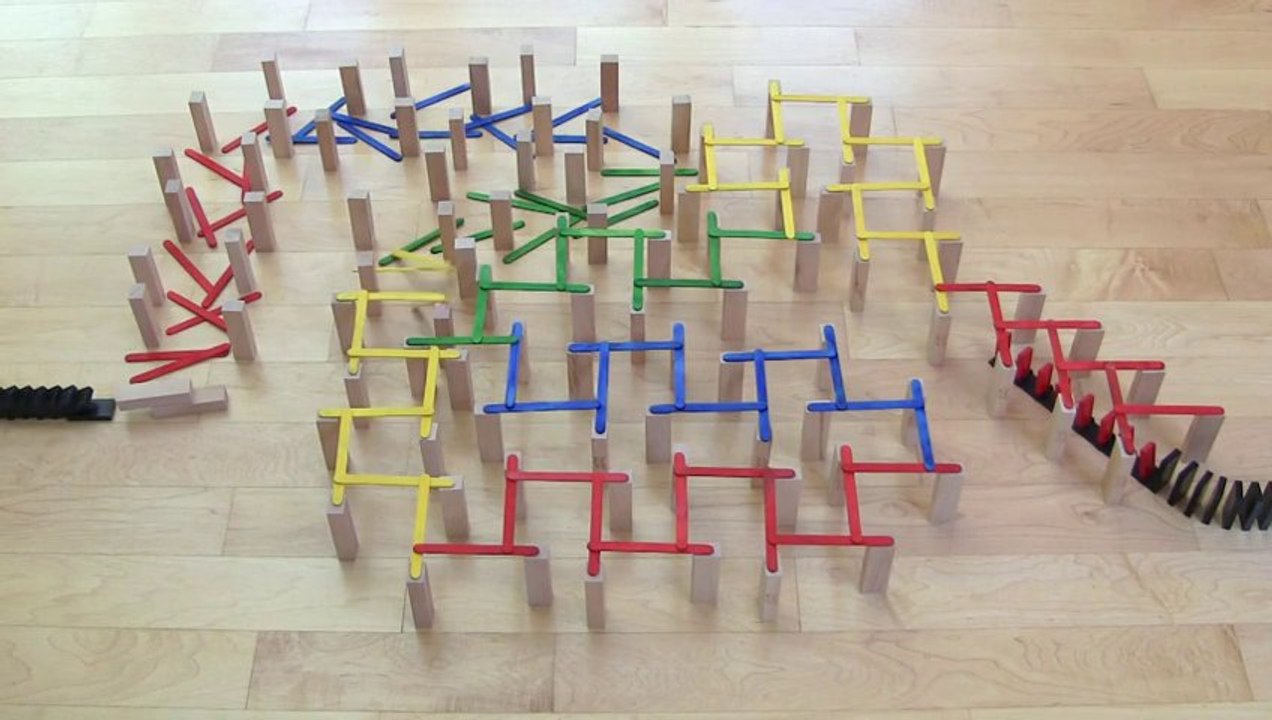 Isane Rube Goldberg Style Domino Tricks