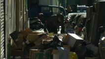 Rubbish piles up in Madrid as refuse collectors strike