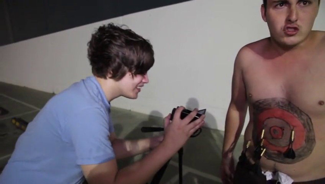 Play with Darts - Human target... Throw Darts on a fat belly!