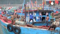 Vietnamese head to shelters as country prepares for Typhoon Haiyan