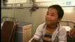 Un petit Chinois atteint de la maladie des os de verre : 