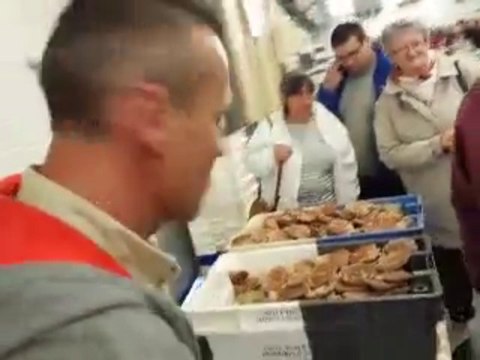 Port-en-Bessin : 60 000 personnes célèbrent la coquille