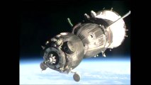 [ISS] Soyuz TMA-11M Docks to ISS with Olympic Torch & New Crew Onboard