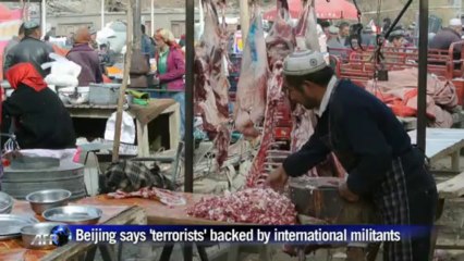 China's Uighurs denounce cultural oppression